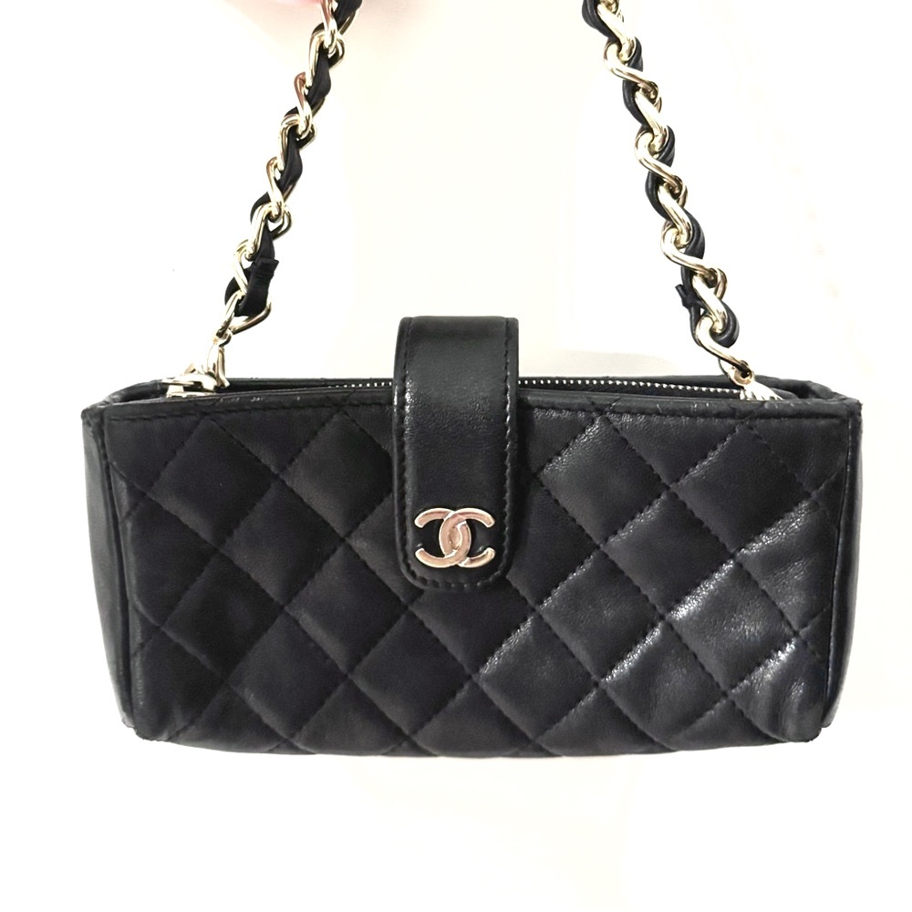 CHANEL Quilted Black Clutch Bag with Gold Chain
